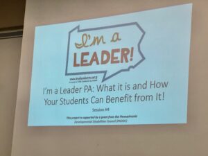 a picture of a powerpoint slide that reads I am a leader PA. What it is and How your students can benefit from it.